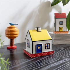 Domeček na svíčku Hal Haines se žlutou střechou